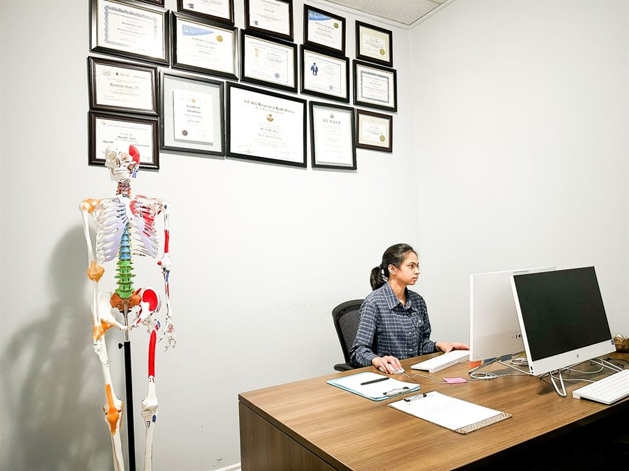 Office wall showing certifications